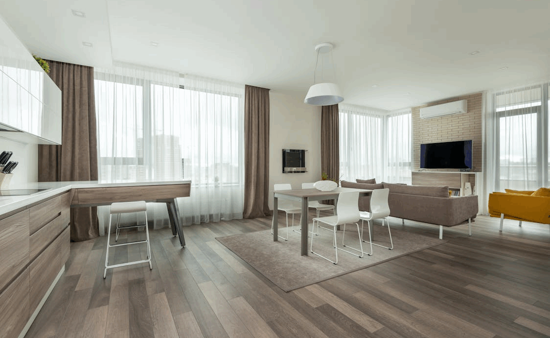 Spacious living room with dining area and kitchen